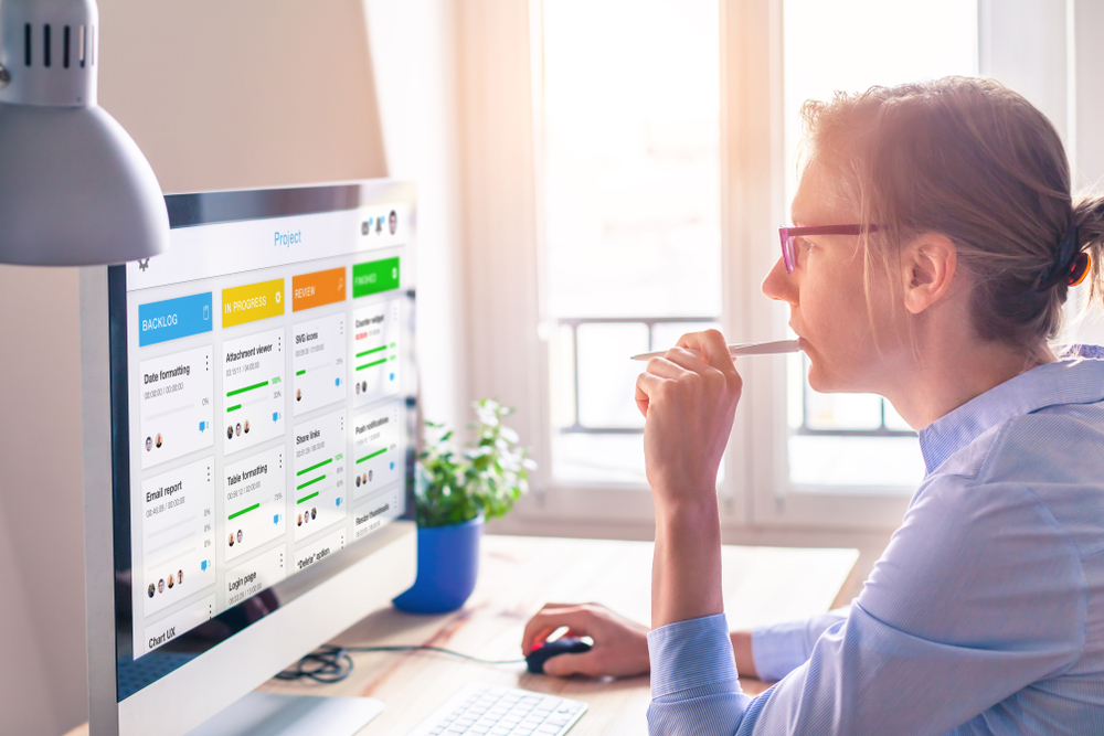 woman working on change management processes in software development